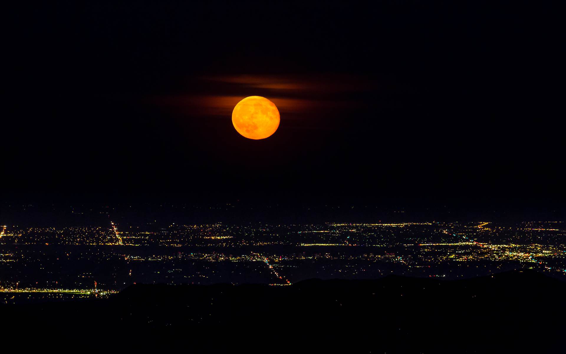 Supermoon from Mt Evans - The supermoon from the Goliath Wilderness Area, Mt Evans. Looking towards Englewood and Littleton, Colorado. by Scott Smith Photos