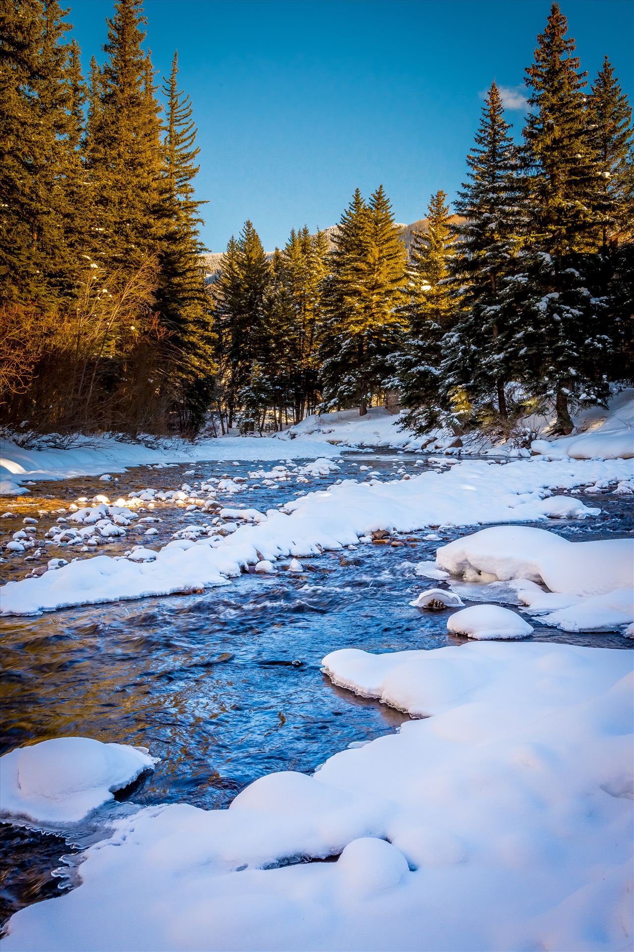 Vail Mountain Stream - The stream that flows through Vail, Colorado, near the famous covered bridge. by Scott Smith Photos