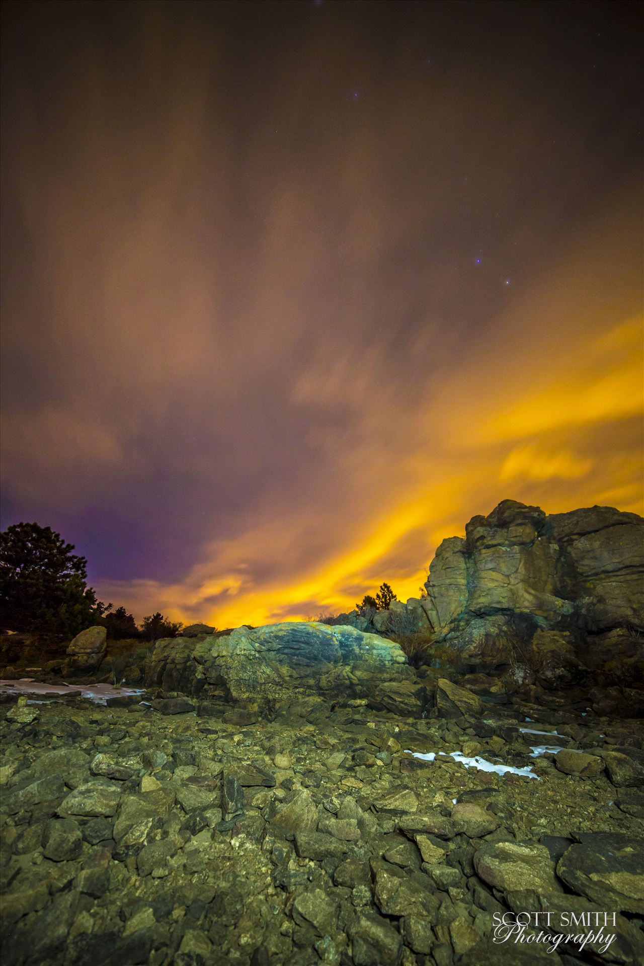 Night Sky on Fire at Mary's Lake - Clouds lit from distant Boulder and Denver light the sky at midnight.  From the shore of Mary's Lake a few miles near Estes Park, looking east towards Denver. by Scott Smith Photos