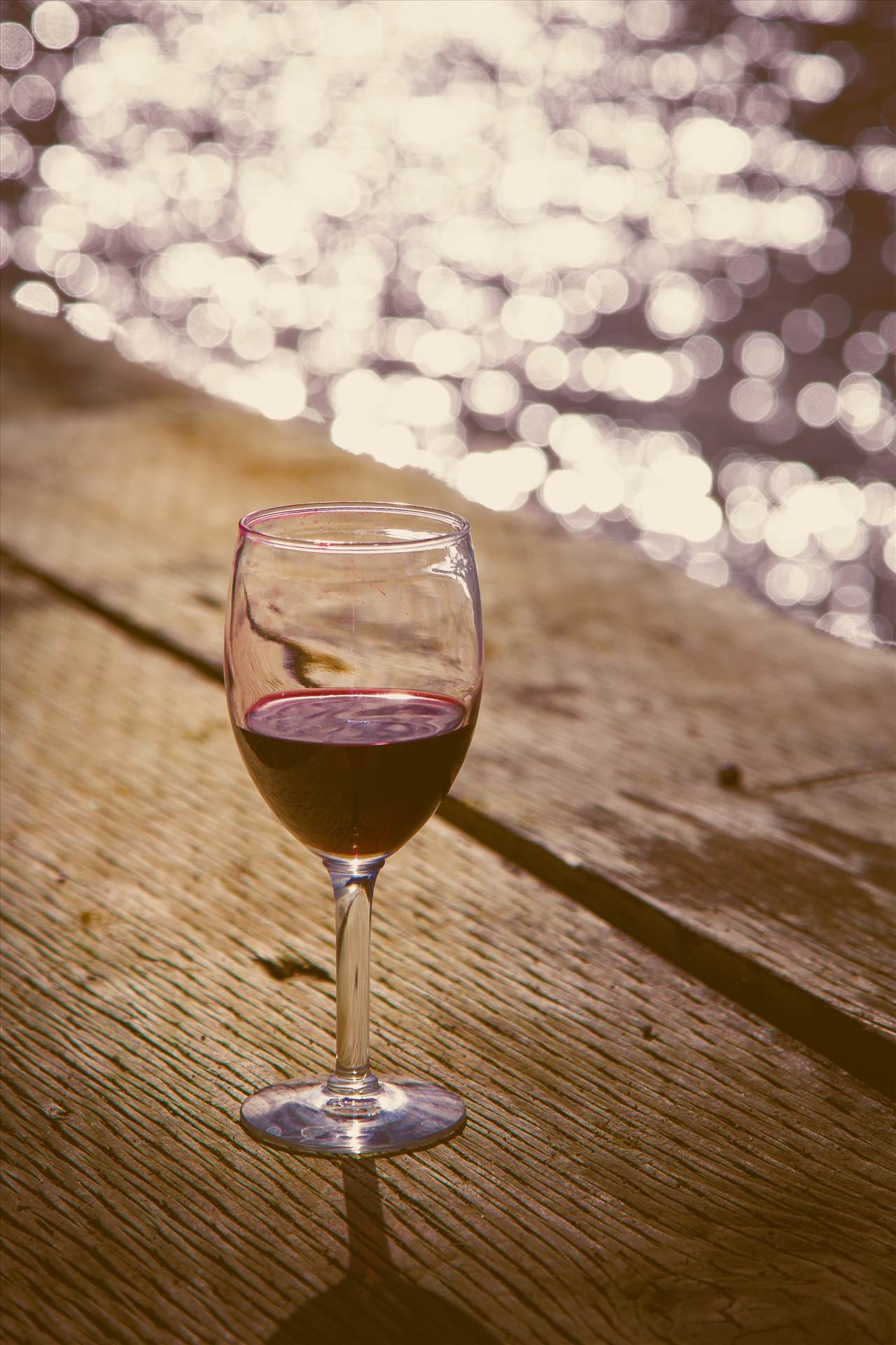 Sunset on the Bay - A glass of wine as the sun sets on Puget Sound, Seattle by Scott Smith Photos