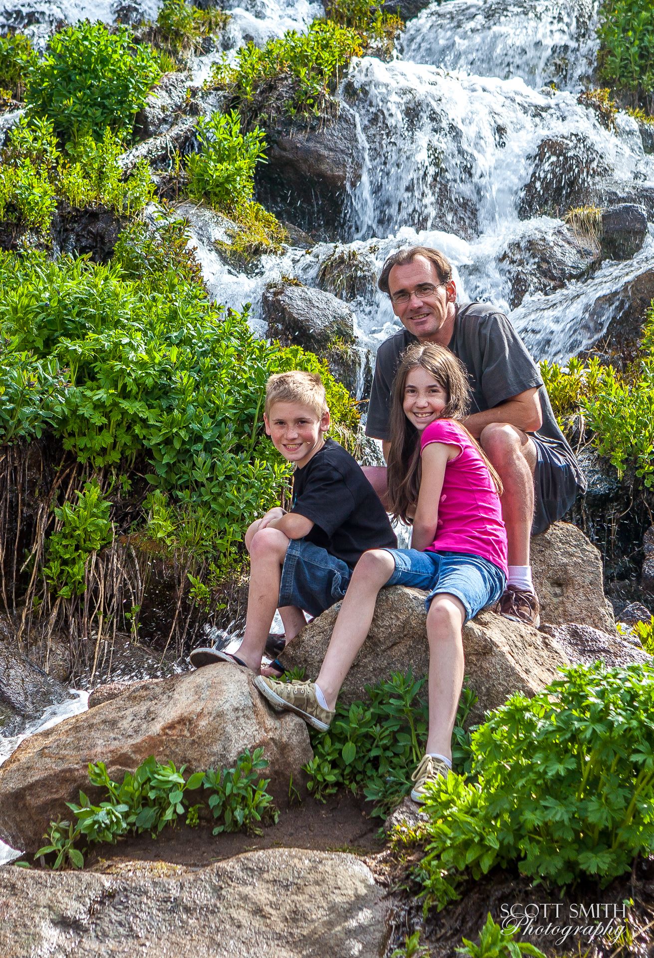 Rocky Mountain National Park Self Portrait - A self portrait of me and my children, in 2011. Shot with a wireless remote trigger. by Scott Smith Photos