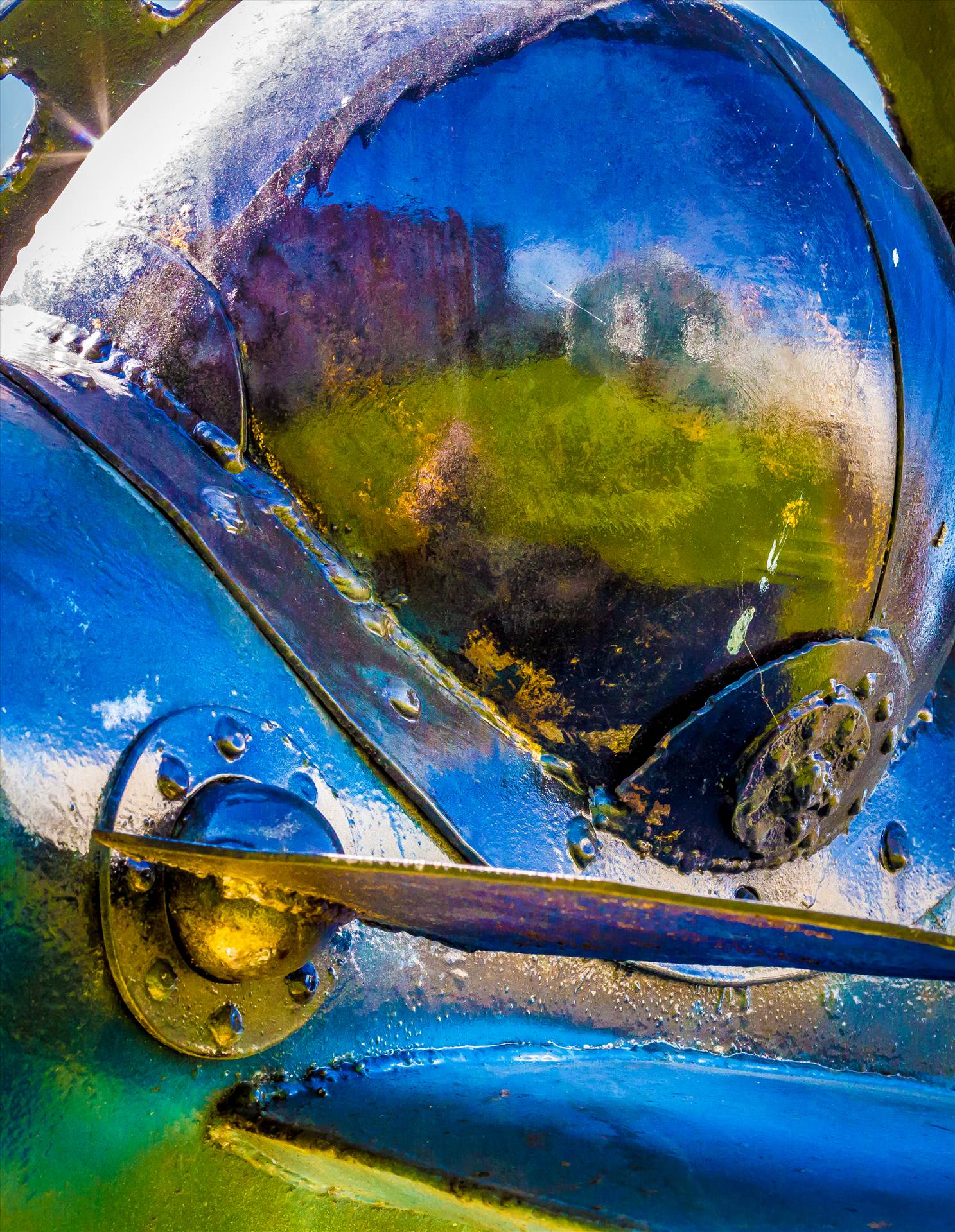 Shimmer - Close-up of an abstract sculputure in Langley, Washington. 'Star Chaser 2' by John Moritz. by Scott Smith Photos