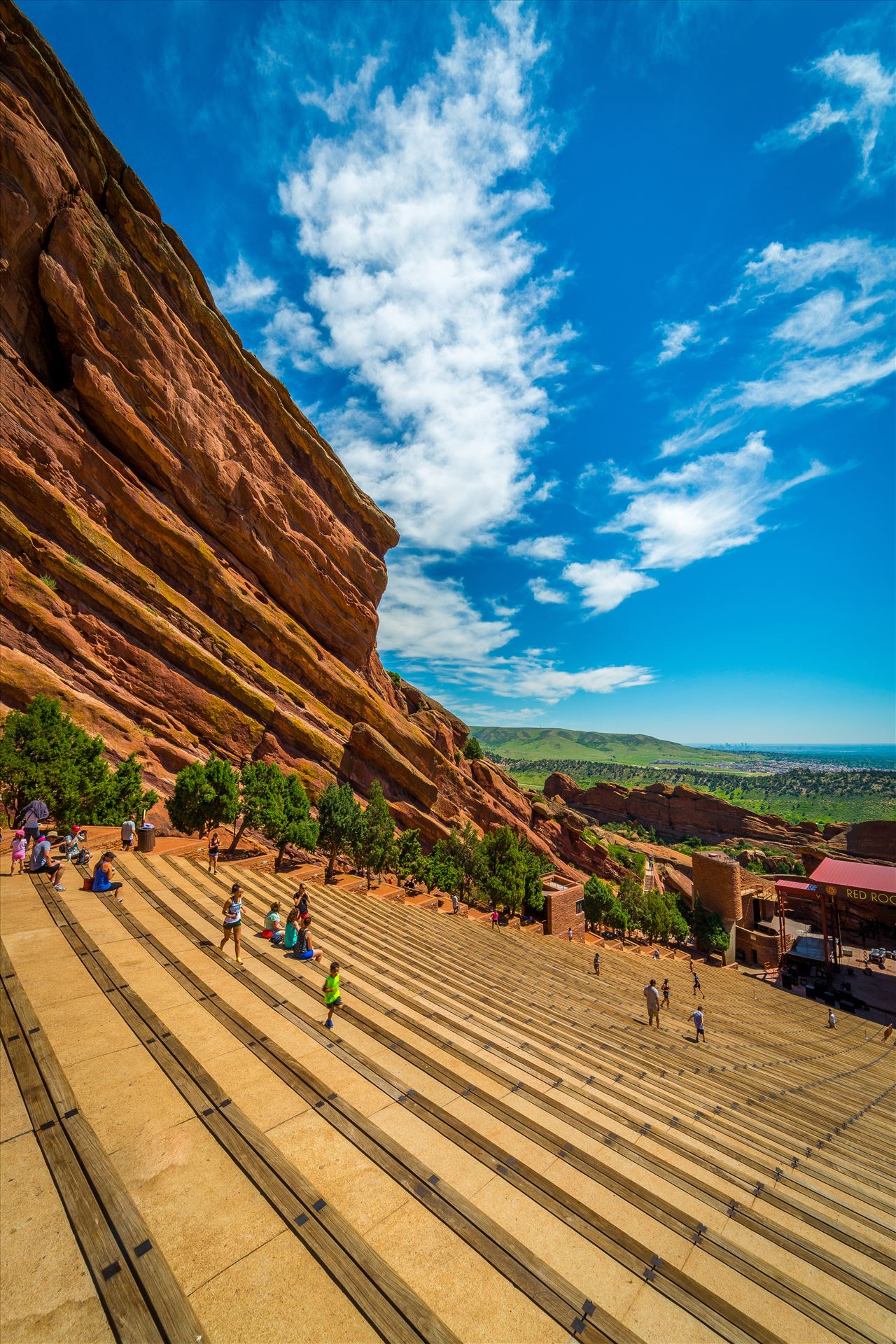 Red Rocks Amphitheater - People getting a workout at Red Rocks amphitheater on a warm Sunday morning. by Scott Smith Photos