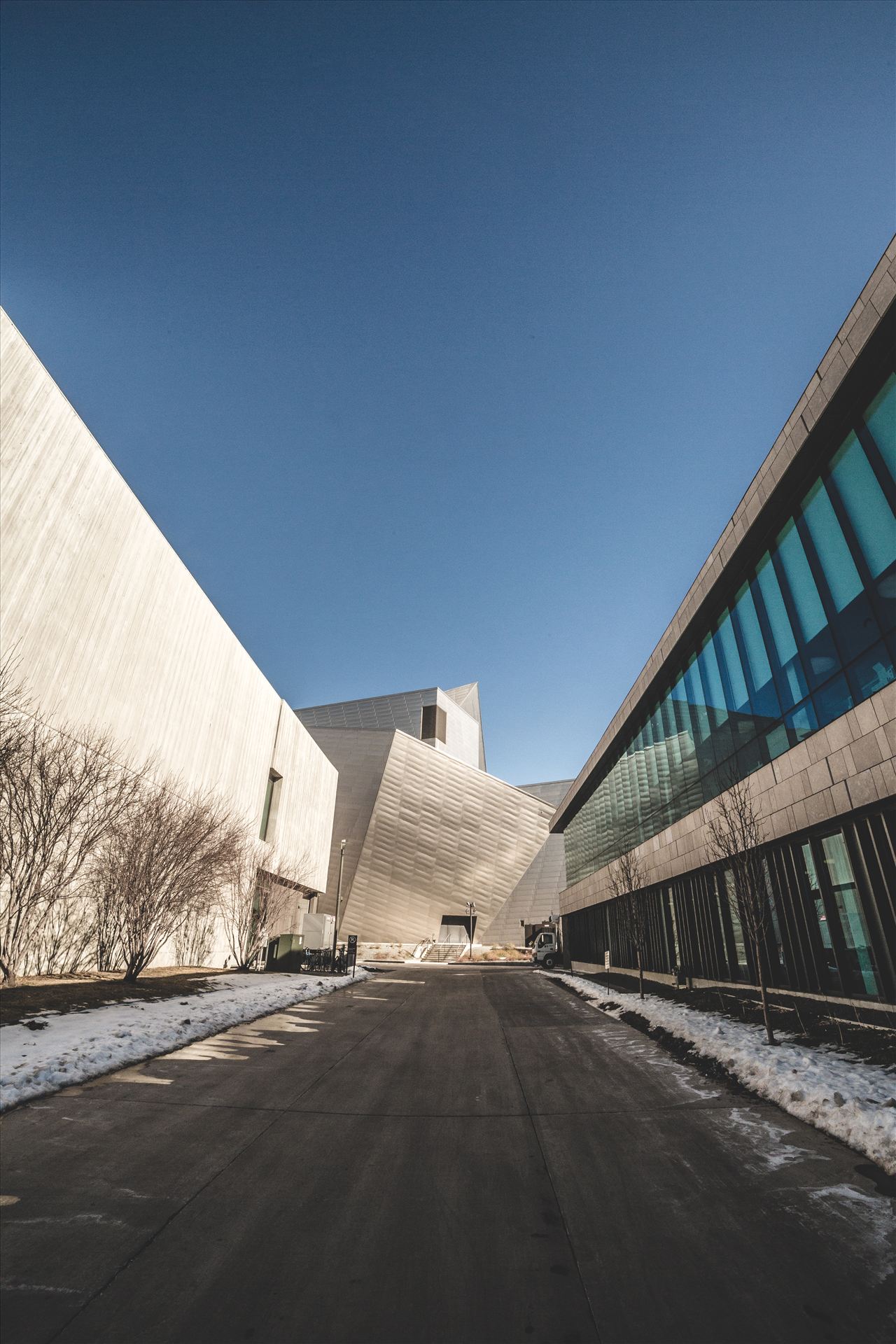 A different view of the Denver Art Museum - I snapped this walking to my car from Civic Center Park, a different view of the Denver Art Museum. by Scott Smith Photos