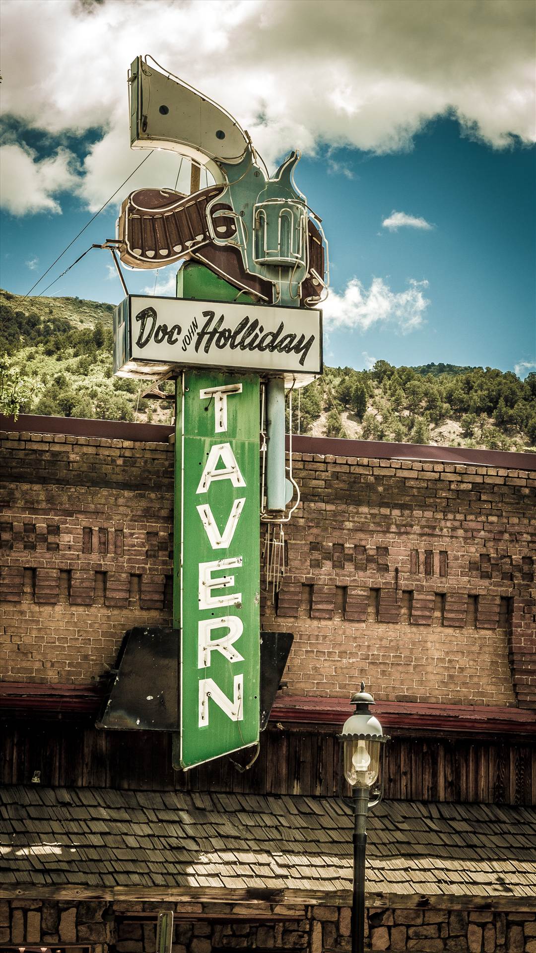 Doc Holliday Tavern in Glenwood Springs - The famous sign for the Doc Holliday Tavern in Glenwood Springs by Scott Smith Photos
