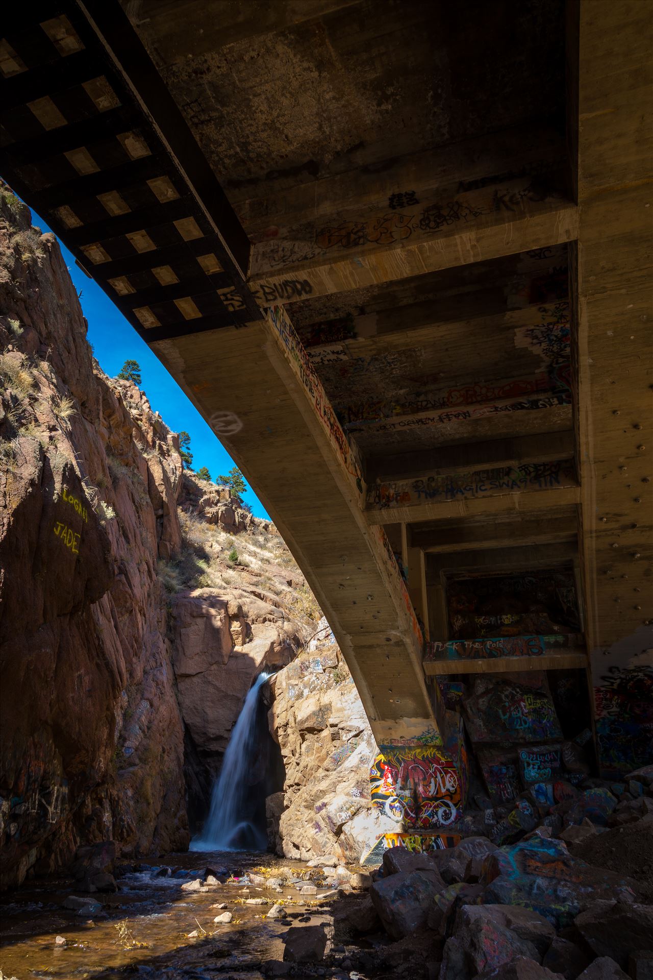 Rainbow Falls - Rainbow Falls, also known as Graffiti Falls, in Manitou Springs, Colorado. by Scott Smith Photos
