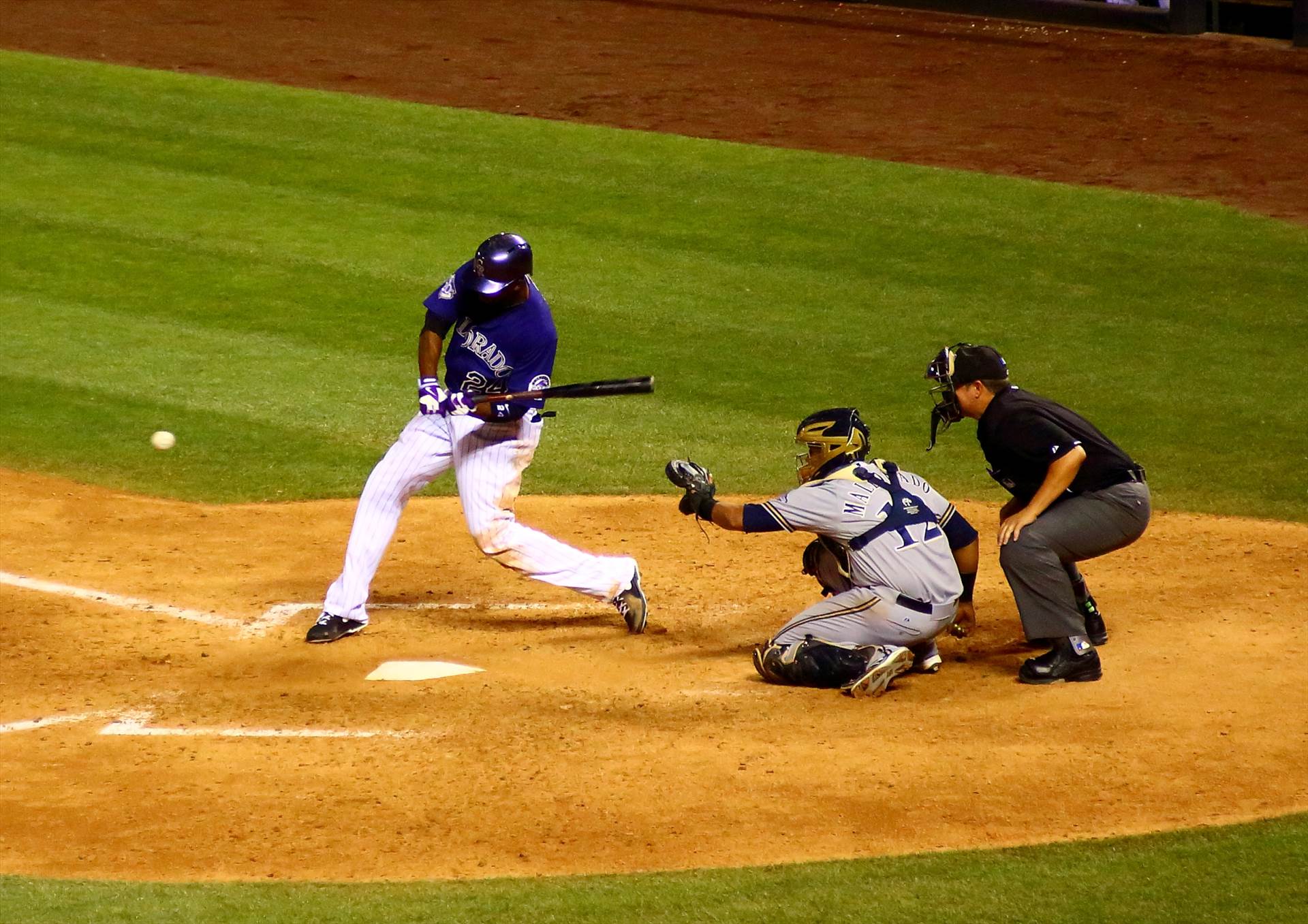 The Rockies Swing Away -  by Scott Smith Photos