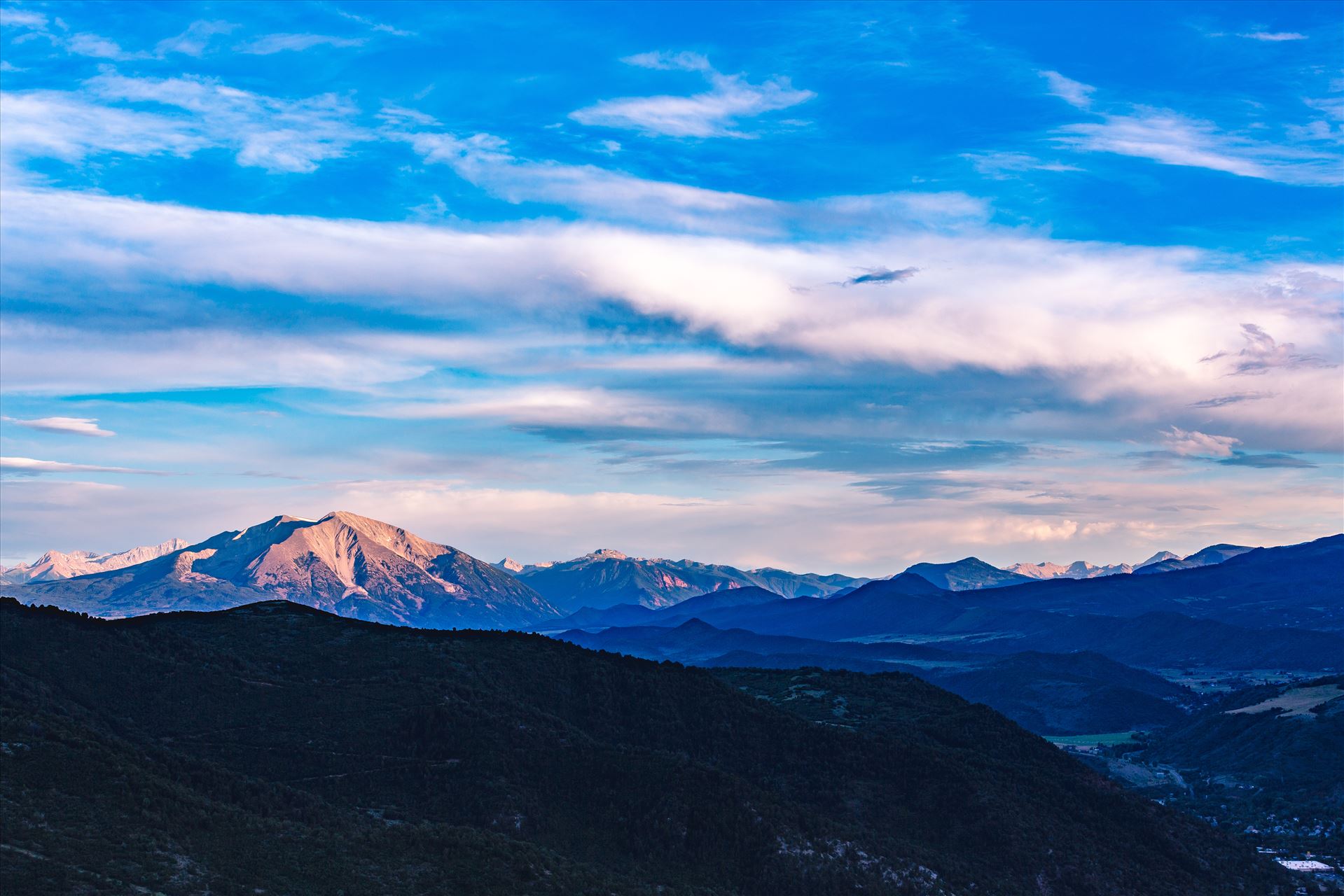 Sunset on Mount Sorpis from Glenwood Caverns - Looking east as the sun sets over Glenwood Caverns, in Glenwood Springs, Colorado. by Scott Smith Photos