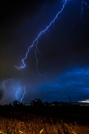 A series of shots from the end of the street, during a powerful lightning storm near Reunion, Colorado.