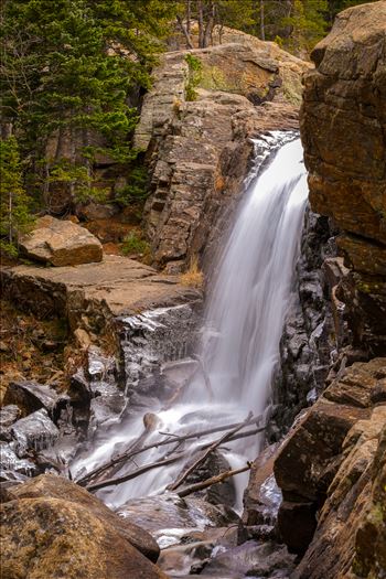 As winter approaches and the temperature starts to drop, ice formations start to appear around Alberta Falls.