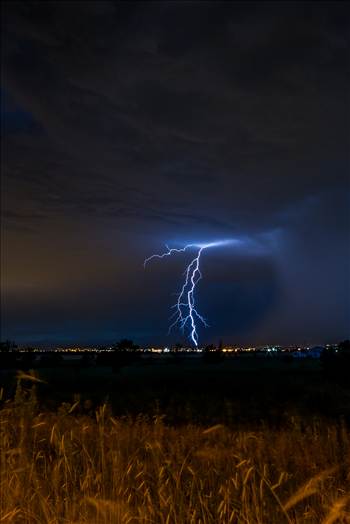 A series of shots from the end of the street, during a powerful lightning storm near Reunion, Colorado.