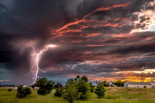 Sunset and the beginning of a major lightning storm, east of Denver, Colorado.