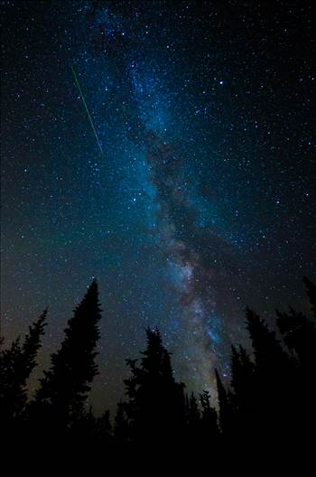 A lone meteorite streaks through the sky near the Milky Way, at the Brainard Lake State Recreation Area near Ward, Colorado.