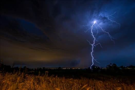 A series of shots from the end of the street, during a powerful lightning storm near Reunion, Colorado.