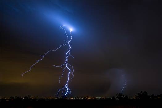 A series of shots from the end of the street, during a powerful lightning storm near Reunion, Colorado.