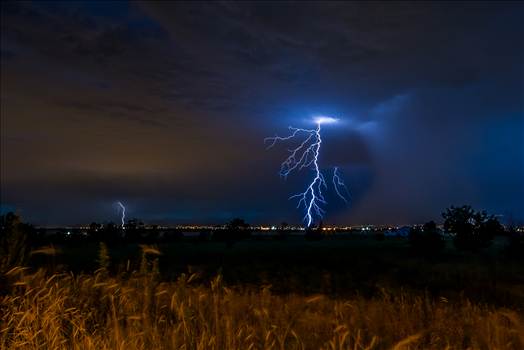 A series of shots from the end of the street, during a powerful lightning storm near Reunion, Colorado.