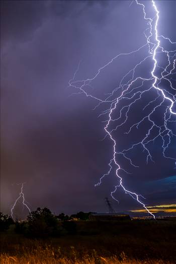 A series of shots from the end of the street, during a powerful lightning storm near Reunion, Colorado. This one was so close it did't fit entirely in the frame.